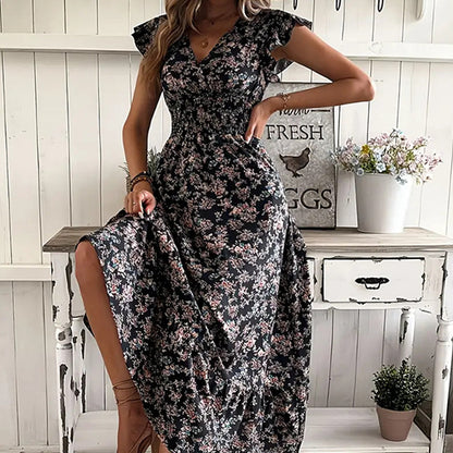💃Zeitlich begrenztes Angebot 2026 – 50% Rabatt☀️ Fließendes Maxikleid mit V-Ausschnitt und Blumenmuster